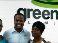Mr. Keilan Johnson - Sales Manager at Green Dot Limited with two of the winning mothers, Ms. Kathleen Jacob (right) and Mrs. Christophe-Branche (left).